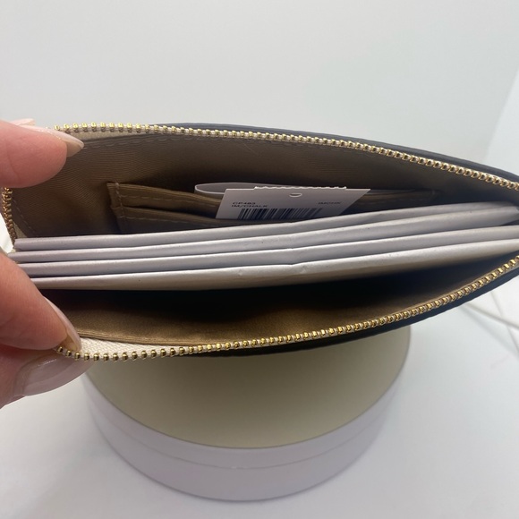 Coach Cream Leather Clutch with Zipper Closure